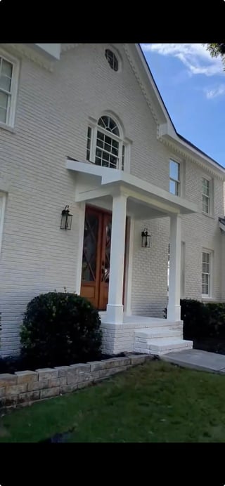 Beautiful farmhouse with fresh exterior paint